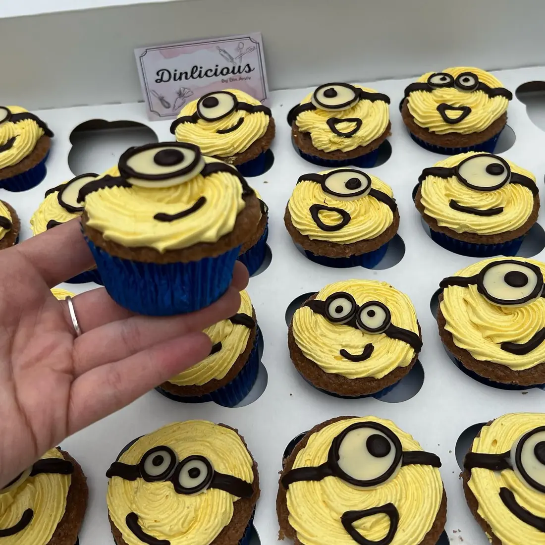Minion themed cupcakes with yellow frosting