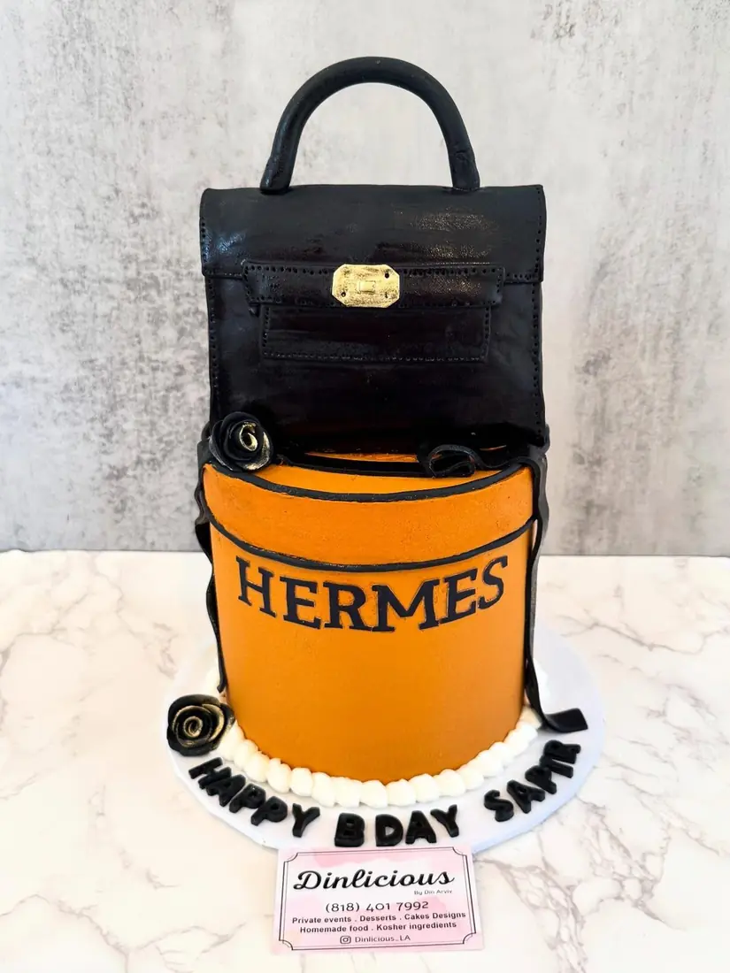 Hermès box sculpted cake with handbag topper by Cakes by Din