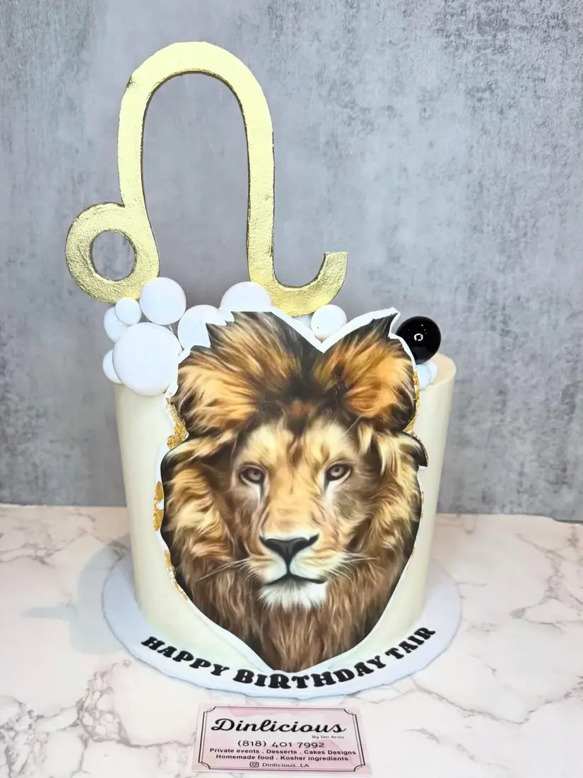 Lion portrait cake with gold number topper by Cakes by Din