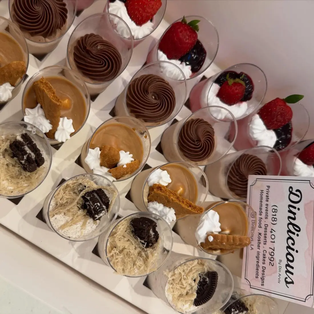 Box of assorted mousse and cheesecake dessert cups